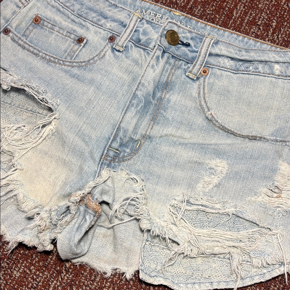 AEO High Rise Festival shorts light wash distressed lace pocket denim shorts 6